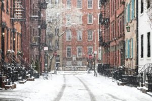 Icy sidewalks concept. Snowy winter scene on Gay Street in the Greenwich Village neighborhood of Manhattan in New York City.